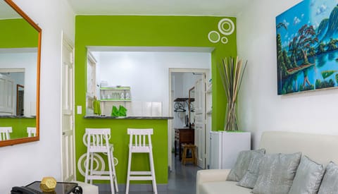 Design Apartment, 1 Bedroom, Refrigerator & Microwave, City View | Living area | Flat-screen TV