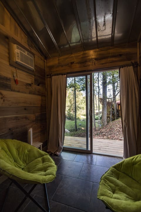 View of Tiny House deck from the bed