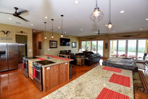 Kitchen has 2 stoves, refrigs, mircrowaves, W/D etc.. Just bring your food.