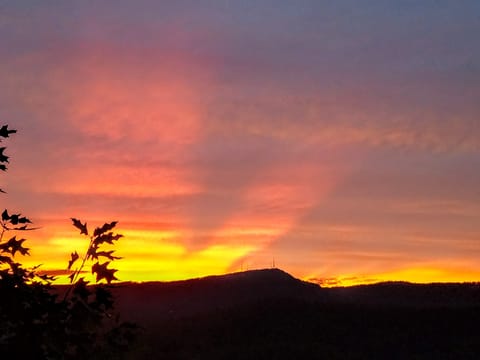 Actual stunning sunset picture taken this Spring from main deck. Bluff Mountain