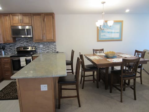 New dining room, table for six.  Also bar stool/chairs.