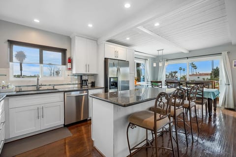 Kitchen, fully stocked, fridge, dishwasher, oven, gas range. Open concept