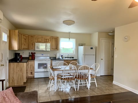 Front Door on the left, Right hand side is the stairs leading to the 2nd floor