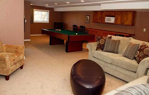 Downstairs pool table and beverage/snack counter.