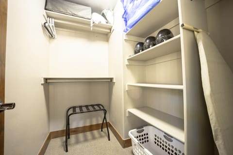 Double queen closet.  Pack n play and 2 booster seats for dining.