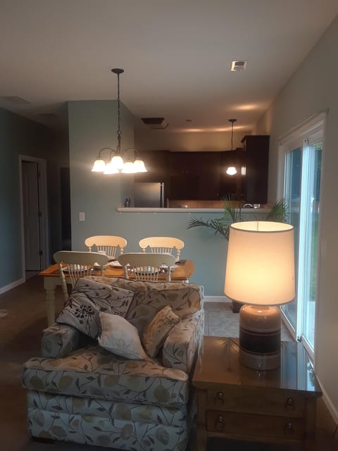 Living room is open to dining area and kitchen. With large screen tv and wi-fi.