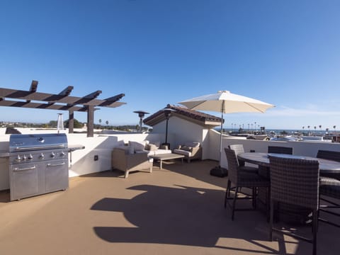 BBQ, Patio Heater, Fire Table, and Umbrella
