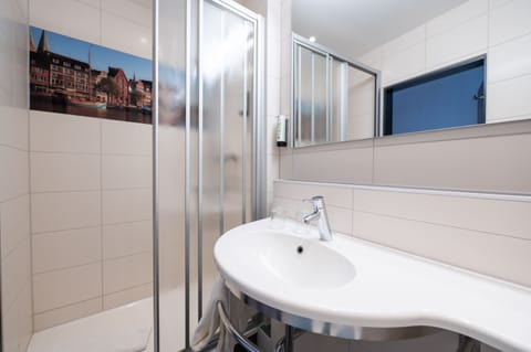 Double Room | Bathroom | Shower, hair dryer, towels, soap