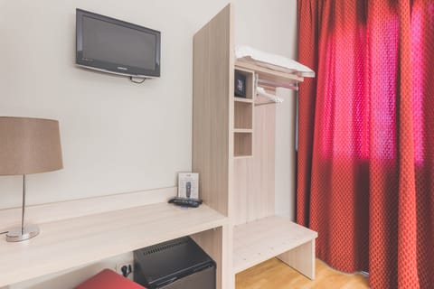 Basic Double Room | Minibar, in-room safe, desk, blackout drapes