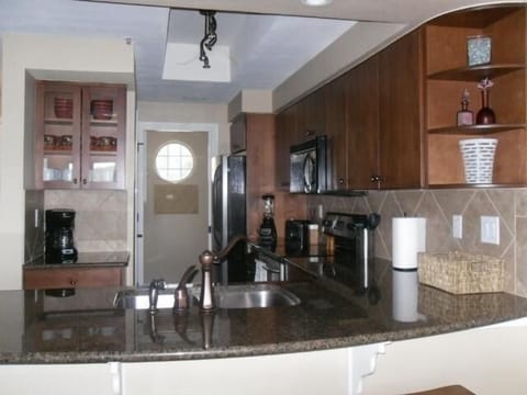 Kitchen with granite countertops