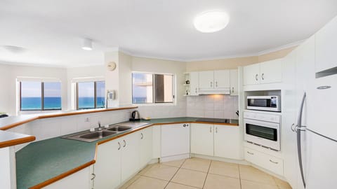 Apartment, 2 Bedrooms, Beach View | Private kitchen | Full-size fridge, microwave, oven, stovetop