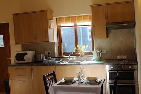 Cottage, 1 Bedroom | Private kitchen | Fridge, microwave, oven, stovetop