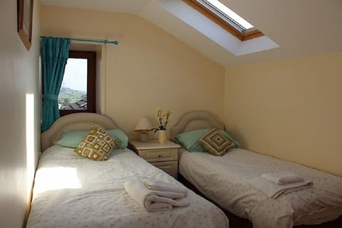 Cottage, 3 Bedrooms (1 Double, 1 Twin, and 1 Triple Bunk) | Desk, iron/ironing board, free wired internet, bed sheets