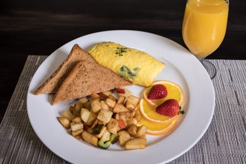 Daily cooked-to-order breakfast (USD 12 per person)