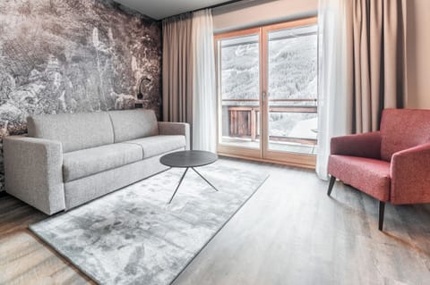 Family Room | 1 bedroom, down comforters, in-room safe, individually decorated