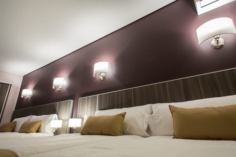 Family Room | Premium bedding, down comforters, minibar, in-room safe