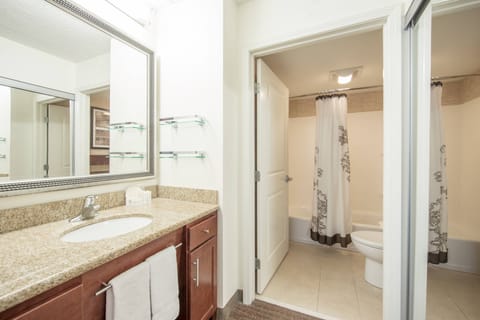 Suite, 1 Bedroom | Bathroom | Combined shower/tub, free toiletries, hair dryer, towels