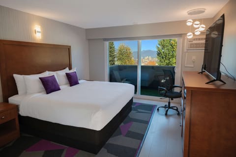 Room, 1 King Bed (Coast) | Premium bedding, Select Comfort beds, individually furnished, desk