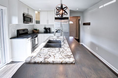 Beautiful granite countertops with live wood edge.