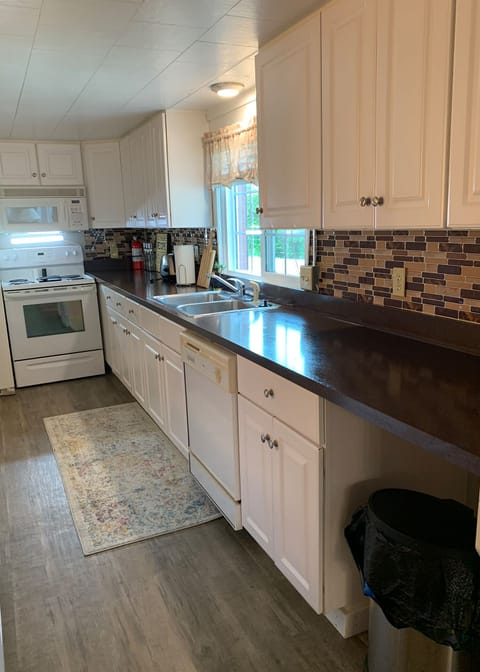 Full kitchen with some basic supplies for your stay.