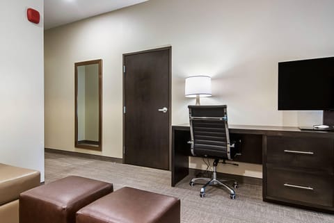 Desk, laptop workspace, blackout drapes, iron/ironing board