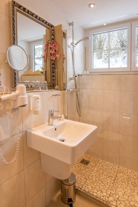 Double Room, Balcony | Bathroom | Shower, hair dryer, bathrobes, towels