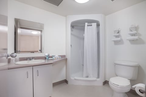 Suite, 2 Bedrooms, Kitchenette | Bathroom | Shower, free toiletries, hair dryer, towels
