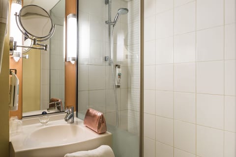 Shower, eco-friendly toiletries, hair dryer, towels