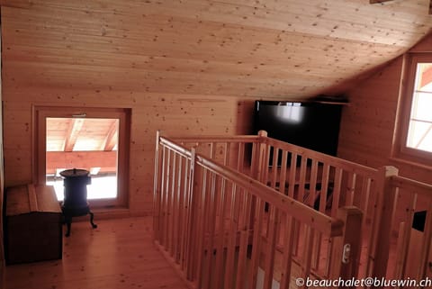 First floor, stairwell and TV corner.