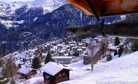 View of the village and the aerial lift from the terrace.