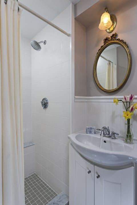 Highland Light Room | Bathroom | Designer toiletries, hair dryer, bathrobes, towels
