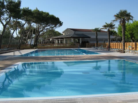 2 outdoor pools, pool umbrellas, sun loungers