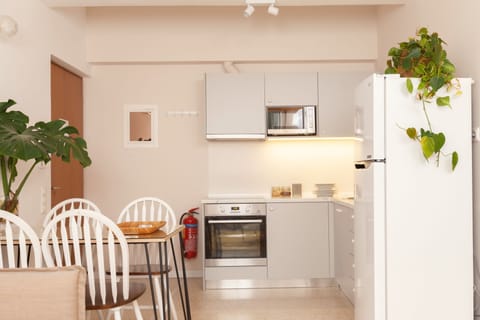 Suite, 1 Bedroom (A2 / B2) | Private kitchen | Fridge, microwave, oven, stovetop