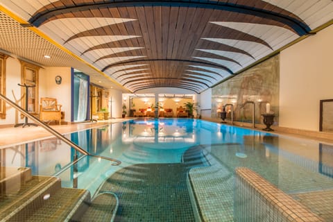 Indoor pool, open 6:00 AM to 8:30 PM, sun loungers