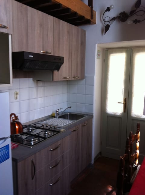 Standard Studio, 1 Bedroom, Patio, Tower | Private kitchen | Fridge, stovetop, coffee/tea maker, electric kettle