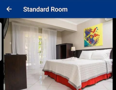 Standard Room | Desk, blackout drapes, iron/ironing board, bed sheets