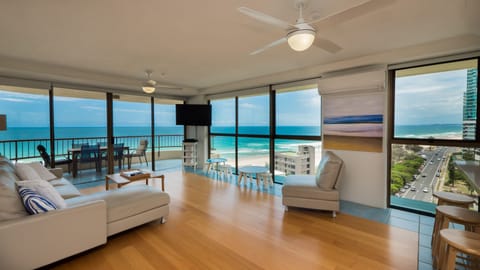 Deluxe Apartment, 3 Bedrooms, Beach View | Living room | Flat-screen TV, DVD player