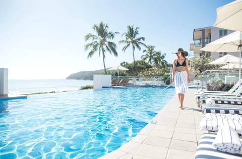 Outdoor pool, pool umbrellas, sun loungers