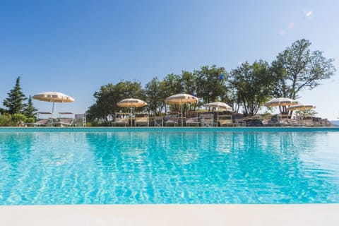 Seasonal outdoor pool, pool umbrellas, sun loungers