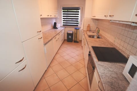 Apartment, 2 Bedrooms (85-00) | Private kitchen | Fridge, stovetop, dishwasher, coffee/tea maker