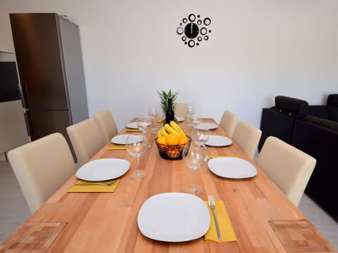 Dining Room, Room, Property, Table, Interior Design, Yellow, Furniture, Orange, Floor, House