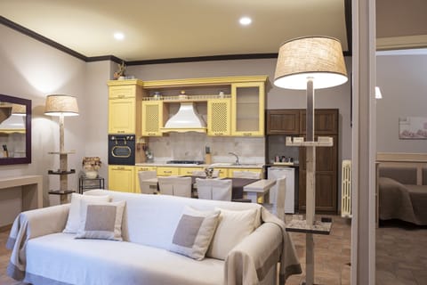 Appartamento familiare - Orchidea | Living area | Flat-screen TV