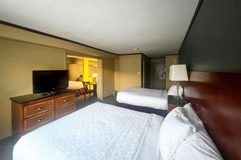 Suite, Multiple Beds, Non Smoking (Efficiency, Upgrade) | Desk, iron/ironing board, bed sheets