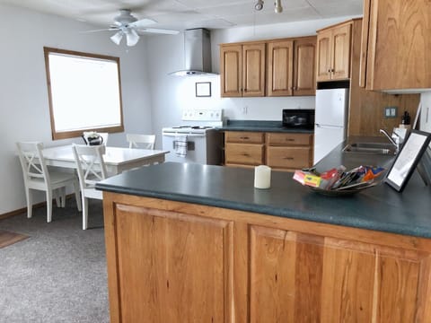 Cozy Cottage Retreat | Private kitchen | Full-size fridge, microwave, coffee/tea maker, toaster