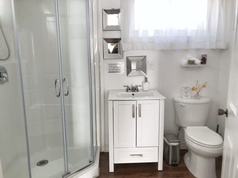 Romantic Studio Cottage | Bathroom | Hair dryer, bathrobes, towels, soap
