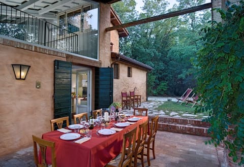 A closer view of the porch prepared for a dinner