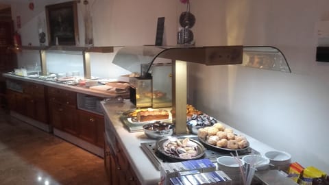 Daily buffet breakfast (EUR 12 per person)