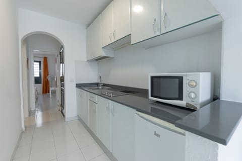 Apartment, 1 Bedroom, Balcony (Sea and/or Pool View) | Private kitchen | Fridge, microwave, stovetop, coffee/tea maker