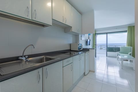 Apartment, 1 Bedroom (Sea and/or Pool View) | Private kitchenette | Fridge, microwave, stovetop, coffee/tea maker