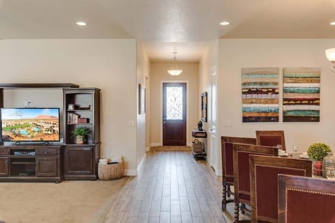 Entry opens to family room and dining areas